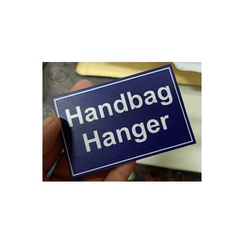 Hand Bag Hanger Sunboard Signage 4Lx3W Inch, Thickness: 3mm (Blue Background, Massage on white)